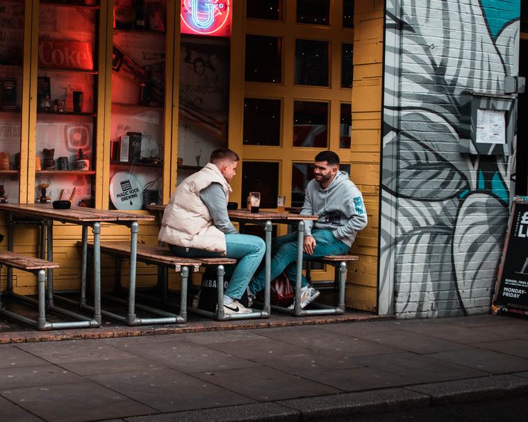 Two men, one table